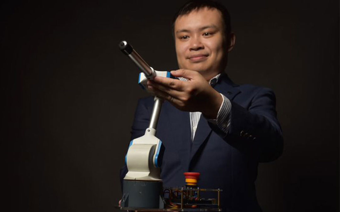 At Arm’s Length – Darwin Lau flexes his robotic arm in teaching